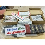 qiqiyg.com valentino garavani toile iconographe sneakers brown white with rockstud detail 2026 new monogram elevated streetwear trend